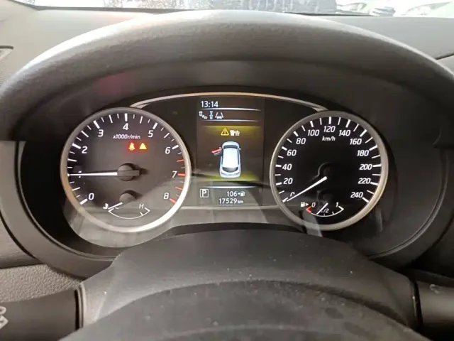 Nissan Tiida — Фото автомобиля 11