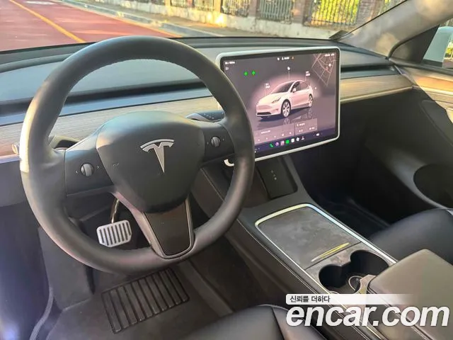 Tesla Model Y — Фото автомобиля 7