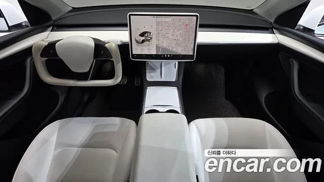 Tesla Model Y — Фото автомобиля 10