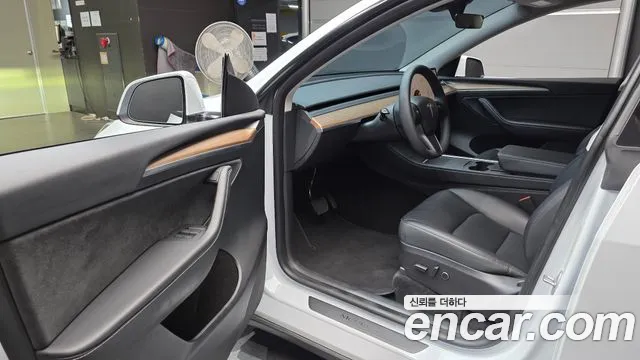 Tesla Model Y — Фото автомобиля 10