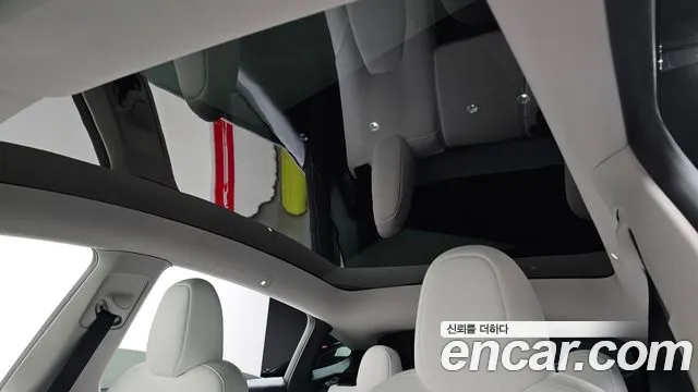 Tesla Model Y — Фото автомобиля 15
