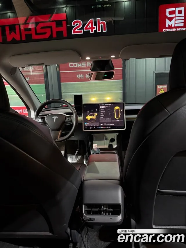 Tesla Model Y — Фото автомобиля 12