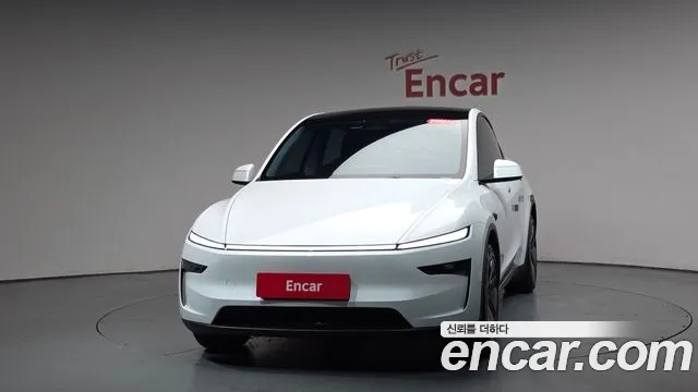 Tesla Model Y — Фото автомобиля 3