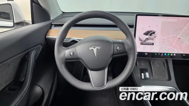Tesla Model Y — Фото автомобиля 11
