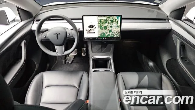 Tesla Model Y — Фото автомобиля 10