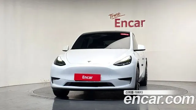 Tesla Model Y — Фото автомобиля 3