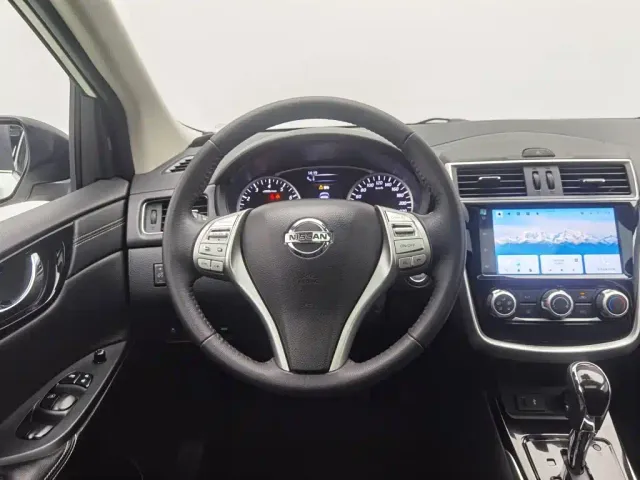 Nissan Tiida — Фото автомобиля 11