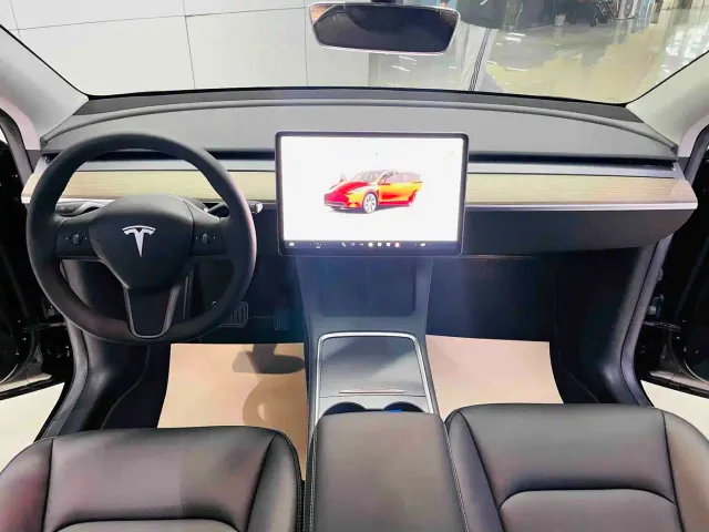 Tesla Model Y — Фото автомобиля 7