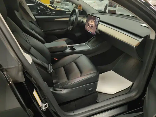 Tesla Model Y — Фото автомобиля 24