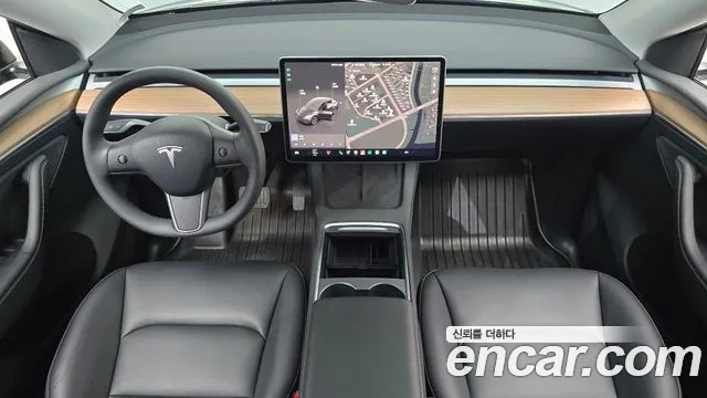 Tesla Model Y — Фото автомобиля 10