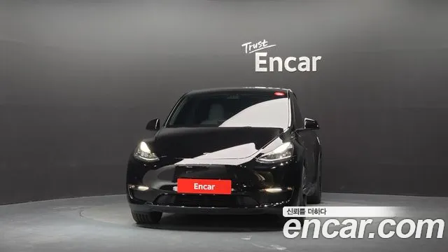 Tesla Model Y — Фото автомобиля 3