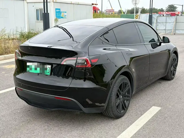 Tesla Model Y — Фото автомобиля 7