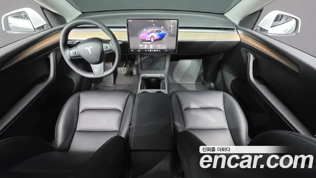 Tesla Model Y — Фото автомобиля 7