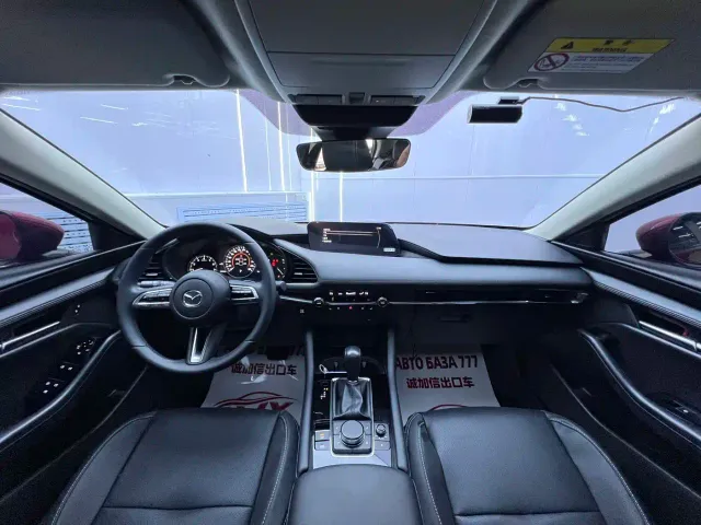 Mazda Axela — Фото автомобиля 15