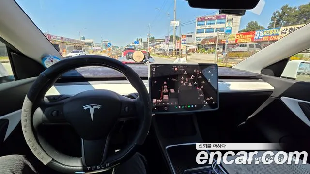 Tesla Model Y — Фото автомобиля 7