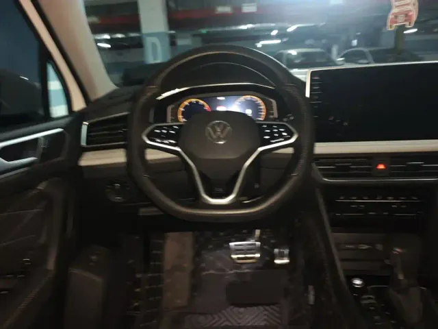 Volkswagen Tiguan L — Фото автомобиля 11