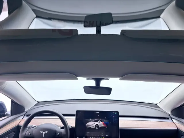 Tesla Model Y — Фото автомобиля 13