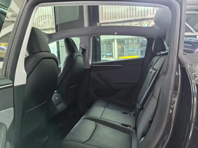 Tesla Model Y — Фото автомобиля 8