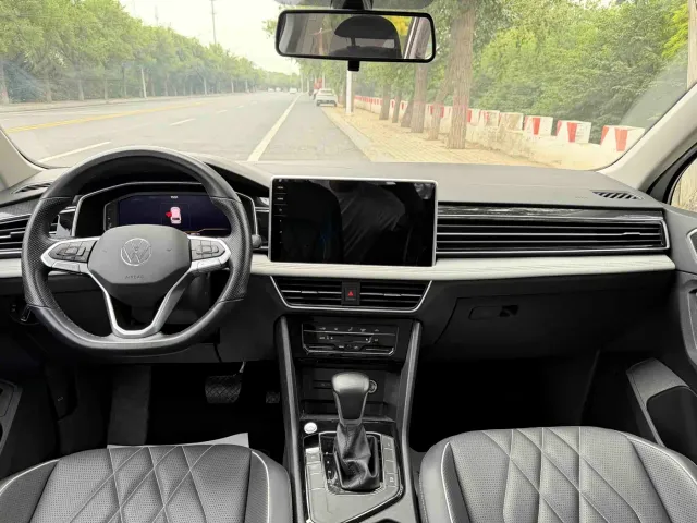 Volkswagen Tiguan L — Фото автомобиля 7