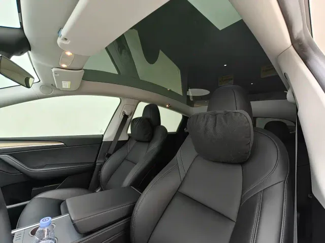 Tesla Model Y — Фото автомобиля 6