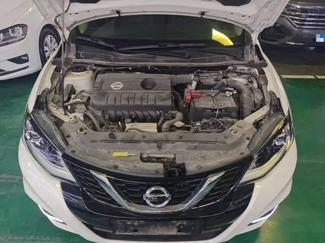 Nissan Tiida — Фото автомобиля 19