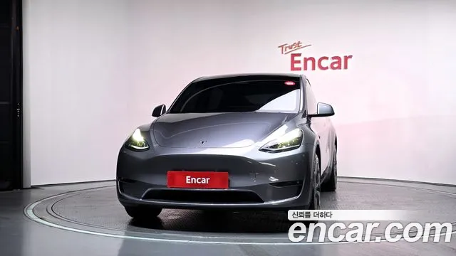 Tesla Model Y — Фото автомобиля 3