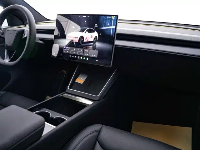 Tesla Model Y — Фото автомобиля 22