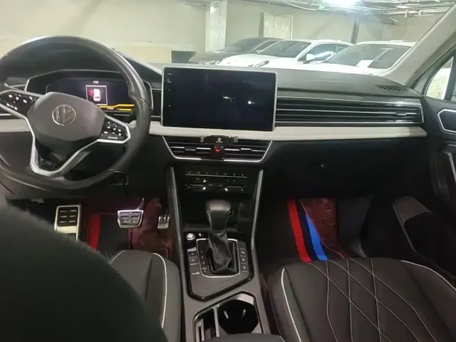 Volkswagen Tiguan L — Фото автомобиля 11