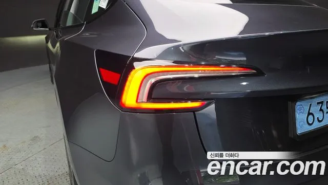 Tesla Model 3 — Фото автомобиля 19