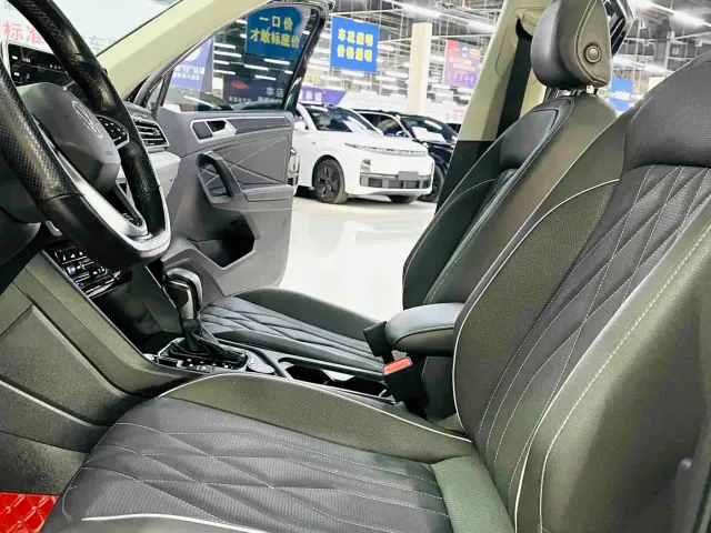 Volkswagen Tiguan L — Фото автомобиля 7