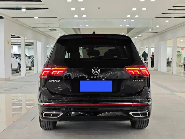 Volkswagen Tiguan L — Фото автомобиля 5