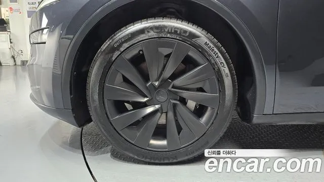 Tesla Model Y — Фото автомобиля 5