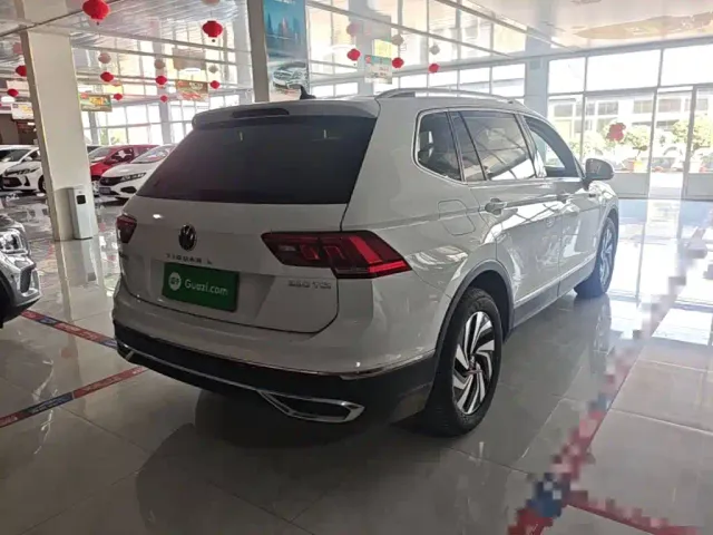Volkswagen Tiguan L — Фото автомобиля 6