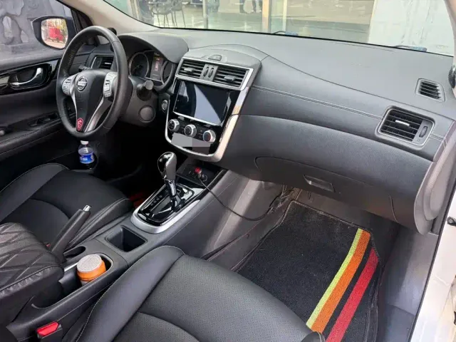 Nissan Tiida — Фото автомобиля 9