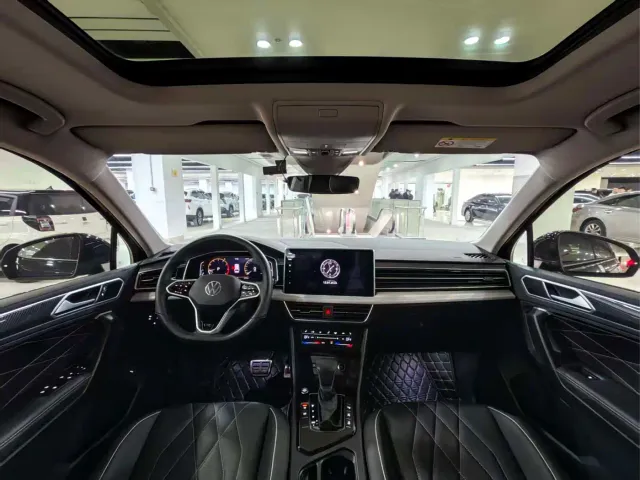 Volkswagen Tiguan L — Фото автомобиля 9