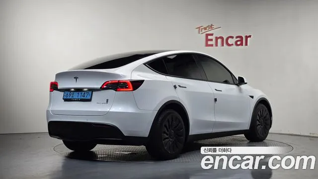Tesla Model Y — Фото автомобиля 2