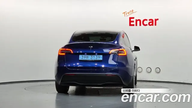 Tesla Model Y — Фото автомобиля 4