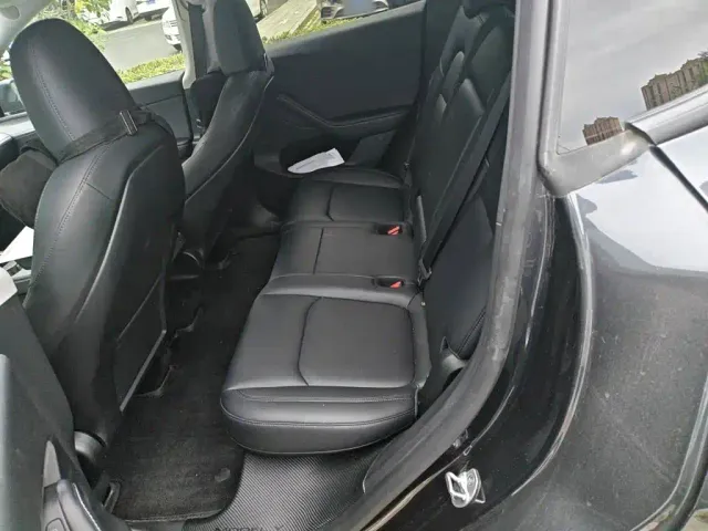 Tesla Model Y — Фото автомобиля 13