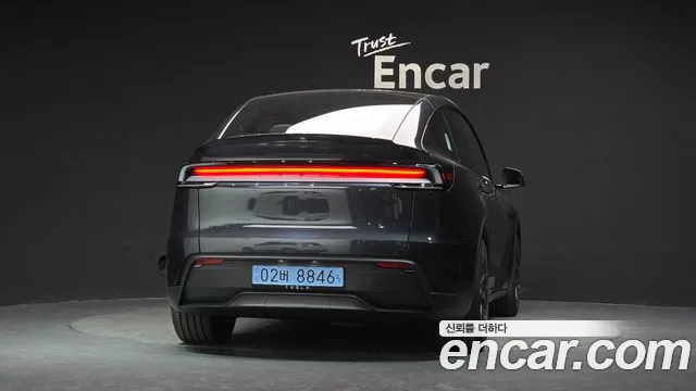 Tesla Model Y — Фото автомобиля 4