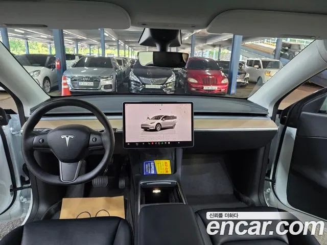 Tesla Model Y — Фото автомобиля 10