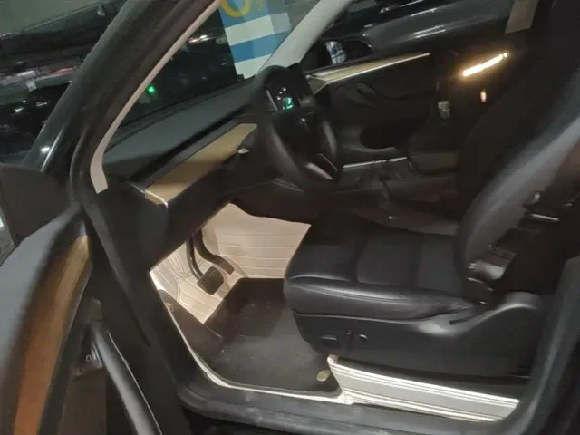 Tesla Model Y — Фото автомобиля 14