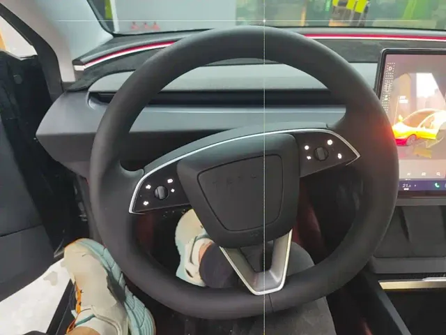 Tesla Model 3 — Фото автомобиля 10