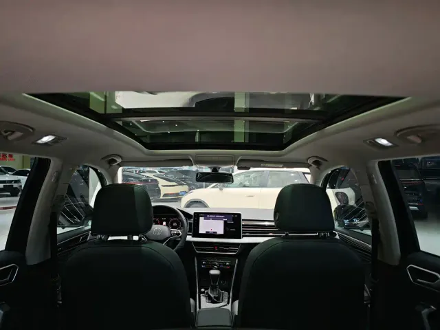Volkswagen Tiguan L — Фото автомобиля 10