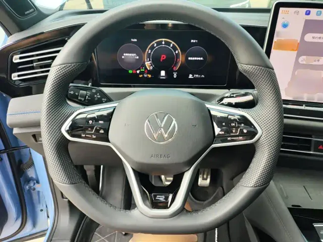 Volkswagen Tiguan L — Фото автомобиля 10