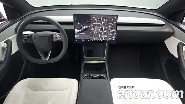 Tesla Model Y — Фото автомобиля 10