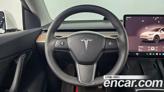 Tesla Model Y — Фото автомобиля 14