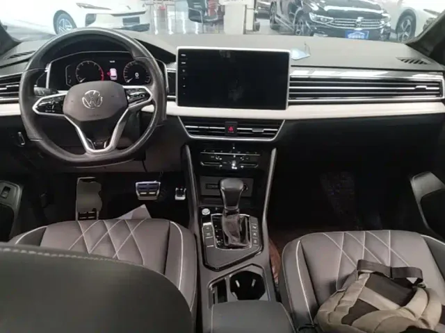 Volkswagen Tiguan L — Фото автомобиля 9