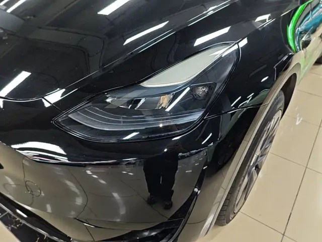 Tesla Model Y — Фото автомобиля 23
