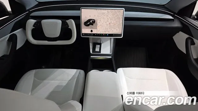Tesla Model Y — Фото автомобиля 10