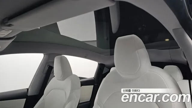 Tesla Model Y — Фото автомобиля 24